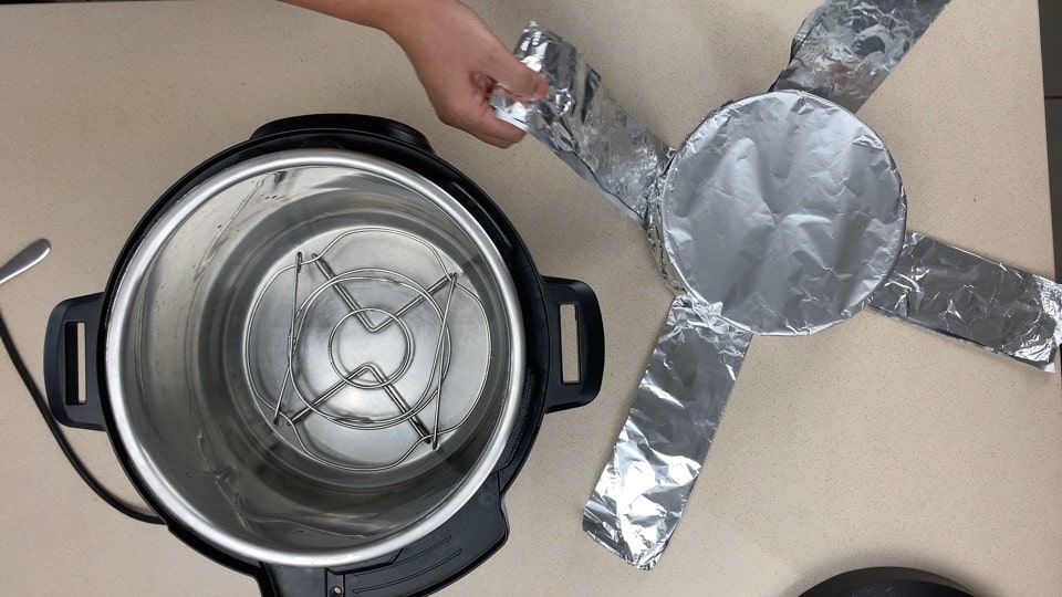 cover the tin with foil before putting in the instant pot