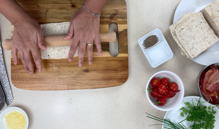 make the bread thin with a rolling pin