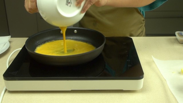 Pour Egg Mix Into Pan