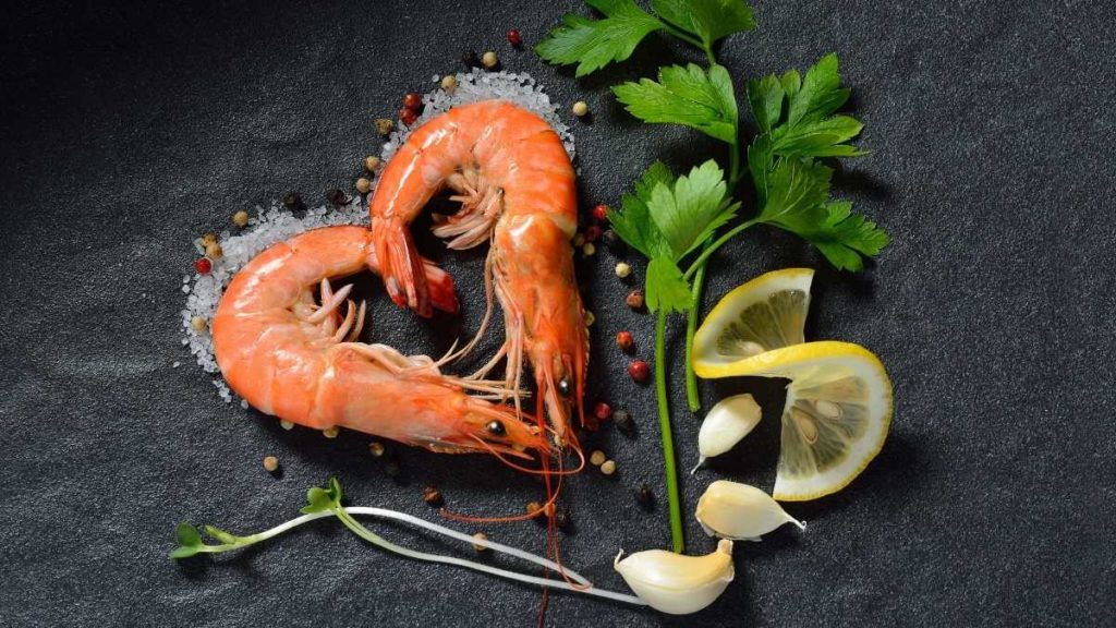 serving creatively presented shrimp for 50 people