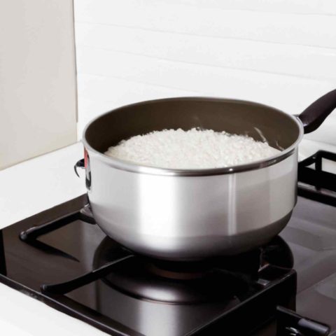 Add More Water To This Pot Of Rice and Re-simmer to fix undercooked rice