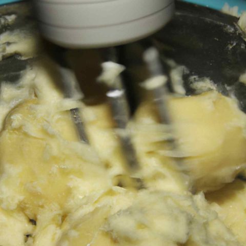 Using a Stick Blender After Squashing the Potatoes with a Rolling Pin